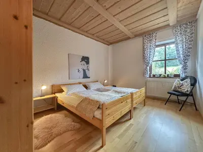 Ein Bett oder Betten in einem Zimmer der Unterkunft Weiherblasch I