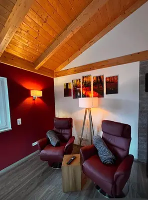 Ein Sitzbereich in der Unterkunft Ferienhaus Fichtelwichtel