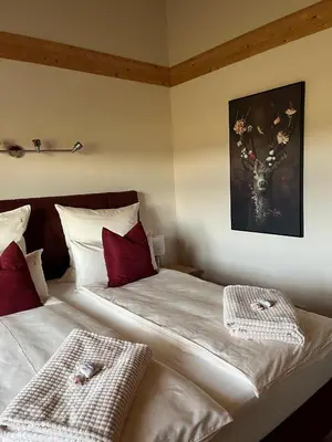 Ein Bett oder Betten in einem Zimmer der Unterkunft Ferienhaus Fichtelwichtel