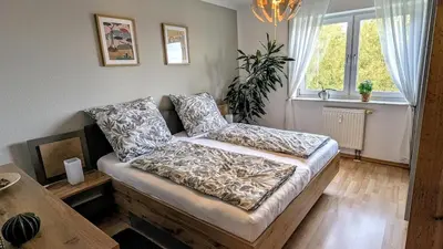 Ein Bett oder Betten in einem Zimmer der Unterkunft Weltenbummler Lodge in Schwarzenberg