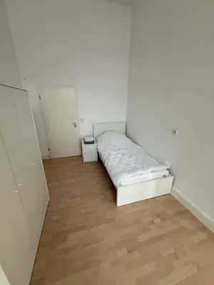 Ein Bett oder Betten in einem Zimmer der Unterkunft Exclusive Monteursunterkunft Kirchenlamitz