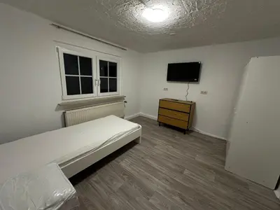 Ein Bett oder Betten in einem Zimmer der Unterkunft Exclusive Monteursunterkunft