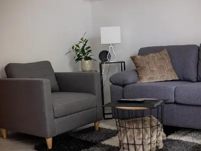 Ein Sitzbereich in der Unterkunft Ferienwohnung Hollerberg