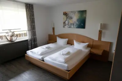 Ein Bett oder Betten in einem Zimmer der Unterkunft Landgasthof Freiberger