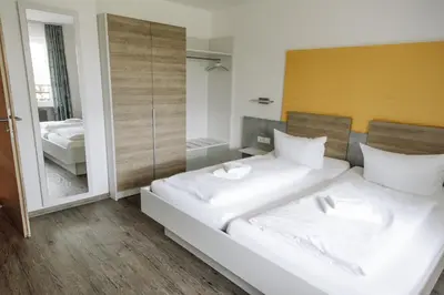 Ein Bett oder Betten in einem Zimmer der Unterkunft Landgasthof Freiberger