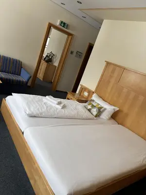 Ein Bett oder Betten in einem Zimmer der Unterkunft Landgasthof Freiberger