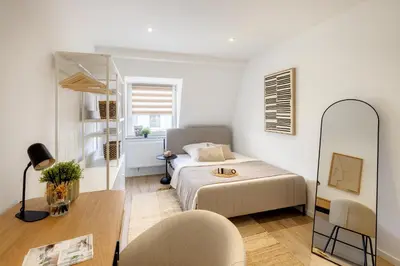 Ein Bett oder Betten in einem Zimmer der Unterkunft Business Apartment nähe Hauptbahnhof
