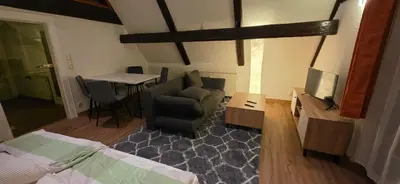 Ein Bett oder Betten in einem Zimmer der Unterkunft Ferienwohnung 