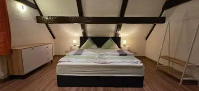 Ein Bett oder Betten in einem Zimmer der Unterkunft Ferienwohnung 
