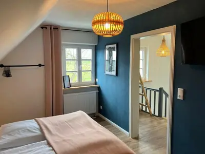 Ein Bett oder Betten in einem Zimmer der Unterkunft Holiday home in Ahorntal with swimming pool