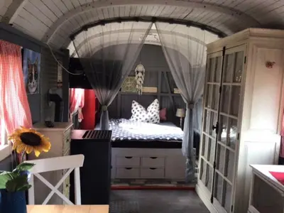 Ein Bett oder Betten in einem Zimmer der Unterkunft Wohnen in einer kleinen Wohnoase
