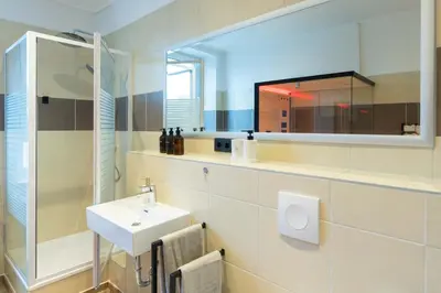 Ein Badezimmer in der Unterkunft FlowApartment Hof, 24h Checkin, IR-Sauna, Parkplatz, WLan250Mbit