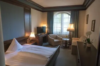 Ein Bett oder Betten in einem Zimmer der Unterkunft Landhaus Deuber