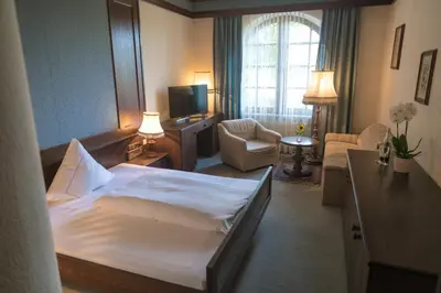 Ein Bett oder Betten in einem Zimmer der Unterkunft Landhaus Deuber