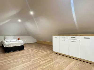 Ein Bett oder Betten in einem Zimmer der Unterkunft STB113 geräumige Monteurwohnung