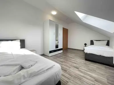 Ein Bett oder Betten in einem Zimmer der Unterkunft STB113 geräumige Monteurwohnung