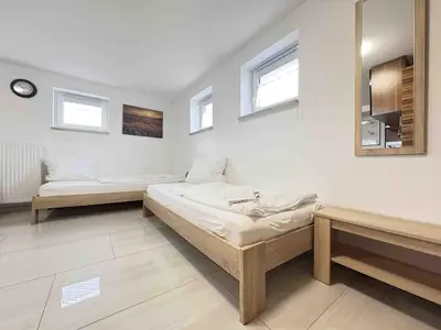 Ein Bett oder Betten in einem Zimmer der Unterkunft STB116 smarte Monteurwohnung