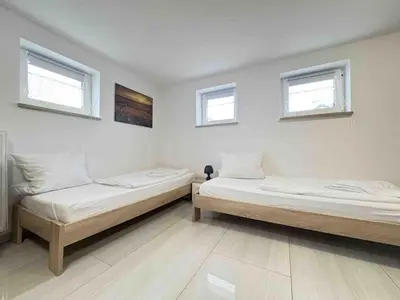 Ein Bett oder Betten in einem Zimmer der Unterkunft STB116 smarte Monteurwohnung