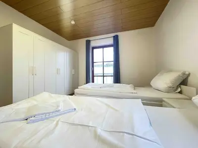 Ein Bett oder Betten in einem Zimmer der Unterkunft SAD262 große Monteurwohnung