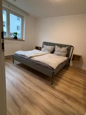 Ein Bett oder Betten in einem Zimmer der Unterkunft Modern apartment with feel-good factor