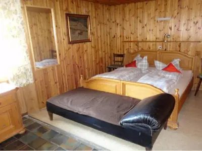Ein Bett oder Betten in einem Zimmer der Unterkunft Hendlmühle