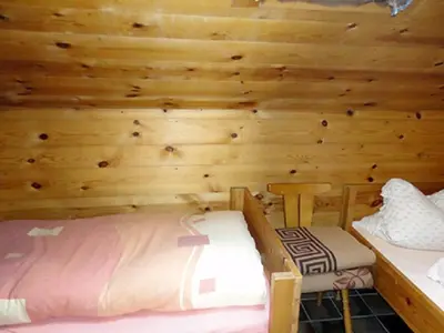 Ein Bett oder Betten in einem Zimmer der Unterkunft Hendlmühle