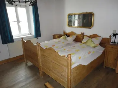 Ein Bett oder Betten in einem Zimmer der Unterkunft Hendlmühle
