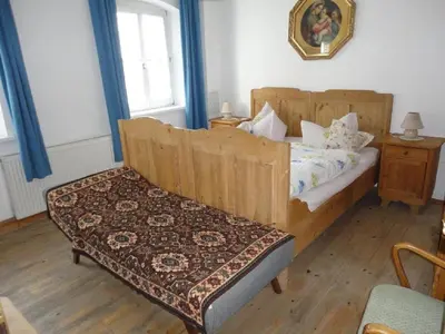 Ein Bett oder Betten in einem Zimmer der Unterkunft Hendlmühle