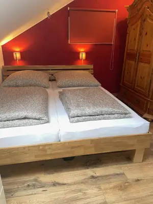 Ein Bett oder Betten in einem Zimmer der Unterkunft All Seasons