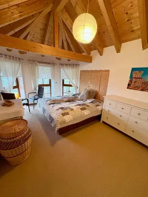 Ein Bett oder Betten in einem Zimmer der Unterkunft LaDolceVital im Tiroler Holzhaus mit Talblick