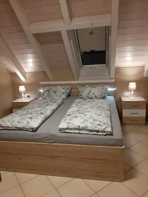 Ein Bett oder Betten in einem Zimmer der Unterkunft Ferienwohnung Ankerplatz