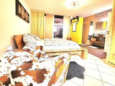 Ein Bett oder Betten in einem Zimmer der Unterkunft Holiday apartment with 1 bedroom