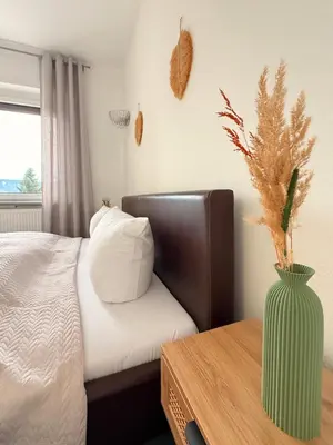 Ein Bett oder Betten in einem Zimmer der Unterkunft Apart 1244 Bergblick