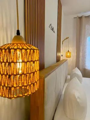 Ein Bett oder Betten in einem Zimmer der Unterkunft Apart 1244 Bergblick