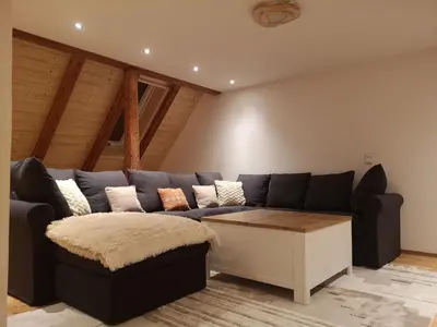 Ein Sitzbereich in der Unterkunft Apartment Moderne Ferienwohnung mit Hot Tub und Fasssauna by Interhome