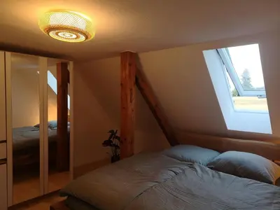 Ein Bett oder Betten in einem Zimmer der Unterkunft Apartment Moderne Ferienwohnung mit Hot Tub und Fasssauna by Interhome
