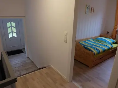 Ein Bett oder Betten in einem Zimmer der Unterkunft Holiday Home am Wald mit Sauna by Interhome