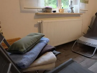 Ein Sitzbereich in der Unterkunft Holiday Home am Wald mit Sauna by Interhome