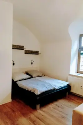 Ein Bett oder Betten in einem Zimmer der Unterkunft Apartment Zum Ritter Ferienwhg by Interhome