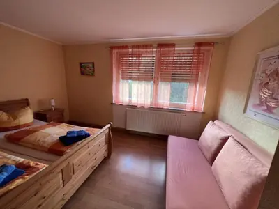 Ein Bett oder Betten in einem Zimmer der Unterkunft Holiday Home Schlossplatz by Interhome