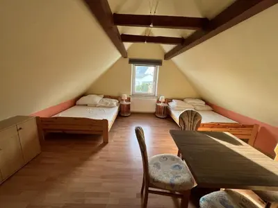 Ein Bett oder Betten in einem Zimmer der Unterkunft Holiday Home Schlossplatz by Interhome