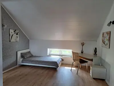 Ein Bett oder Betten in einem Zimmer der Unterkunft Apartment Panoramadomizil by Interhome