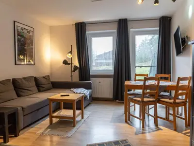 TV/Unterhaltungsangebot in der Unterkunft Apartment mit zwei Schlafzimmern und Terrasse by Interhome