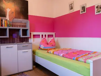 Ein Bett oder Betten in einem Zimmer der Unterkunft Apartment mit Balkon und zwei Schlafzimmern by Interhome