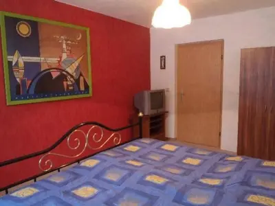 Ein Bett oder Betten in einem Zimmer der Unterkunft Apartment Erzgebirge by Interhome