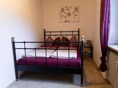 Ein Bett oder Betten in einem Zimmer der Unterkunft Apartment auf einem Reiterhof by Interhome