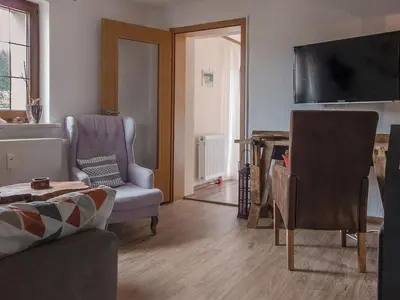 TV/Unterhaltungsangebot in der Unterkunft Apartment mit Blick auf das Wasser by Interhome