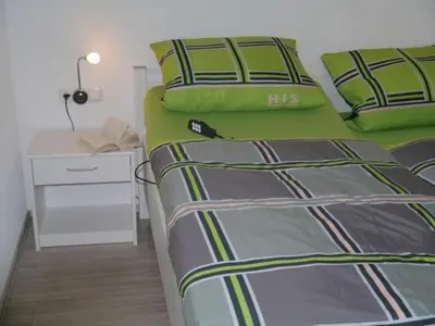 Ein Bett oder Betten in einem Zimmer der Unterkunft Apartment Gästehaus Siebert by Interhome