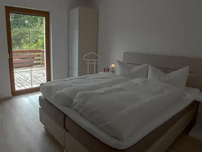 Ein Bett oder Betten in einem Zimmer der Unterkunft Apartment Appartement mit Bergblick by Interhome