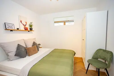 Ein Bett oder Betten in einem Zimmer der Unterkunft Fidelios Altstadt Appartements